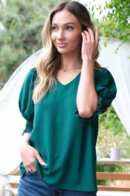 SOLID WOVEN SHORT SLEEVE V NECK TOP