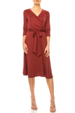 Solid, faux wrap dress with deep V-neck and waist tie.