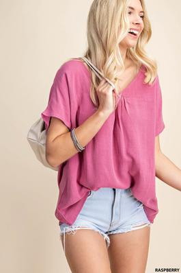 DROP SHOULDER V NECK TOP WITH PIN-TUCKED DETAILING AND A KEYHOLE BUTTON CLOSURE AT BACK.