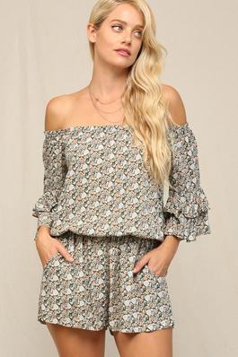 A ROMPER FEATURED IN AN OFF THE SHOULDER NECKLINE.