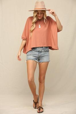 THIS OVERSIZED STYLE A FLOWY SILHOUETTE TOP.