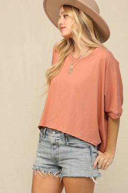 THIS OVERSIZED STYLE A FLOWY SILHOUETTE TOP.