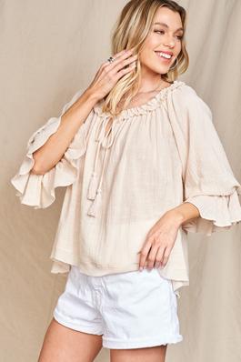 A FLOWY TIE-FRONT SILHOUTTE WITH SLEEVES.