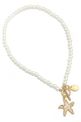 PEARL TOGGLE NECKLACE WITH SHELL AND STAR CHARMS